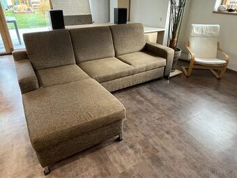 Rohová rozkládací sedačka s úložným prostorem