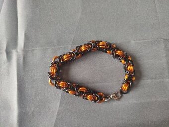 Náramek z kroužků oranžová a černá