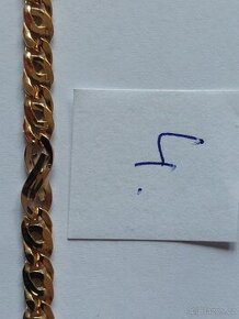 Zlatý řetízek na ruku z 18k zlata.