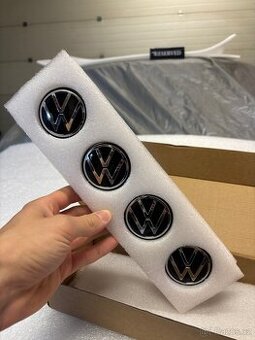 Za jízdy nehybné Krytky středových děr na ALU disky VW