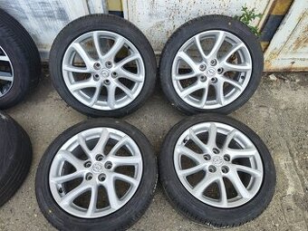 17"letní alu sada 5x114 origo Mazda 3 6 5 205/50 Falken