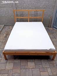 Dřevěná postel IKEA 140 cm