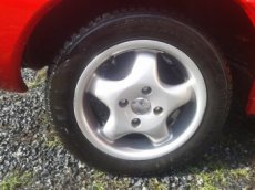 alu aluet 4 x 14 palců rozteč 108 pneu 185/60/14 Ford