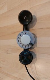 Telefon s integrovaným číselníkem ve sluchátku