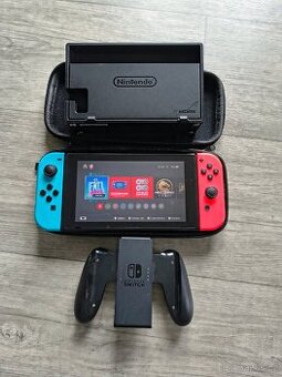 Nintendo switch + stanice + účet 29 her
