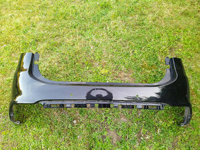 Zadní originální nárazník Kia Carens