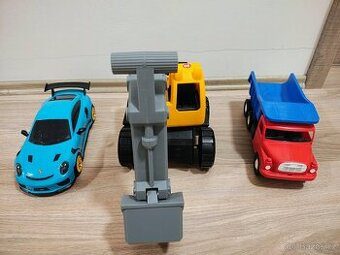 Auto Porsche s úložným prostorem, Tatra nakládní auto, bagr