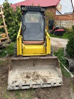 Prodám smykový nakladač Komatsu Sk 07