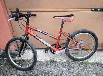 Červené dětské kolo Olpran. Velikost kol 24.