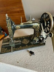 Starý šicí stroj