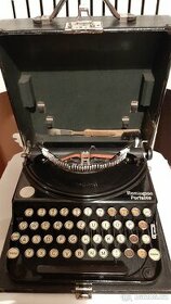 Starožitný kufříkový psací stroj