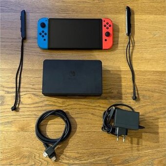 Nintendo Switch OLED + 7 her