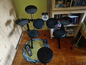 Elektronické bicí Alesis DM7 + sedačka Drumcraft