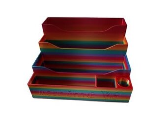 Barevný stojan na Albitužku a knihy