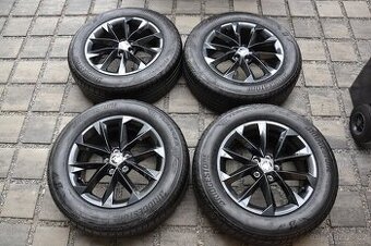 Š.Kamiq,Scala, VW Taigo – NOVÉ Alu + letní 205/60R16 Bridges