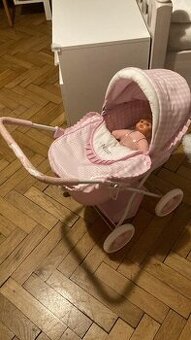 Dětský kočárek s panenkou