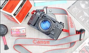 Canon A-1 + Canon 50mm f/1.4 FDnew, brašná, f-ční, nová bat.