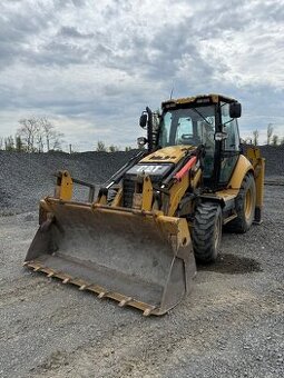 Traktorbagr Cat 428F