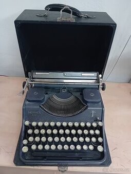 Kufříkový psaci stroj HERMES 2000
