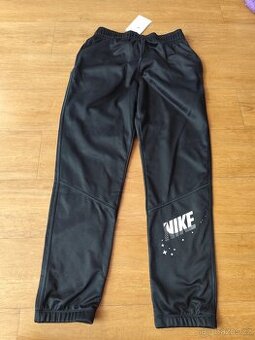Sportovní dětské tepláky Nike Therma fit L 146-158
