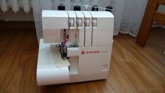 Prodám Overlock Singer S010L