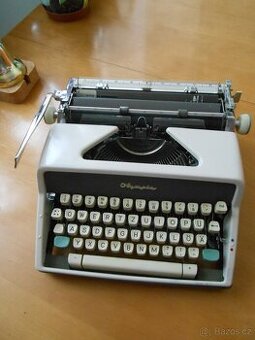 Starý psací stroj OLYMPIA  WERKE  AG.WILHELMSHAVEN
