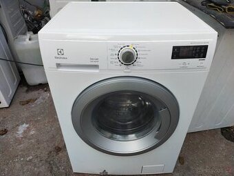 Prodám  dig.pračku se sušičkou zn.ELECTROLUX--7/4KG--DOVEZU-