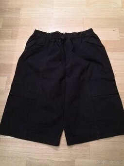 Prodloužené tmavomodré kraťasy do gumy, vel. 164