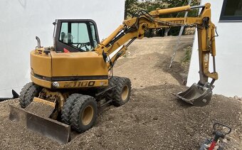 Kolové rypadlo HYDREMA M1100