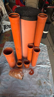 KG potrubí + zpětná klapka s revizní šachtou.