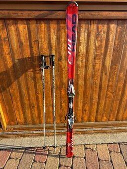 Lyže Head a tyčky Fizan