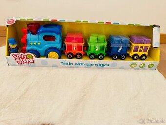 Veselý vláček s vagónky Early Steps – světýlka & zvuky