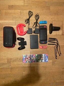 Nintendo Switch + 2 hry + 4x Joy-Con + příslušenství
