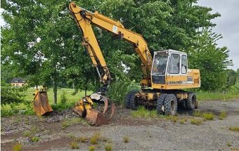 Liebherr 902 Litronic svahovka, drapák