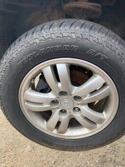Hyundai Tucson kola, pneu a nová nápravnice - 1