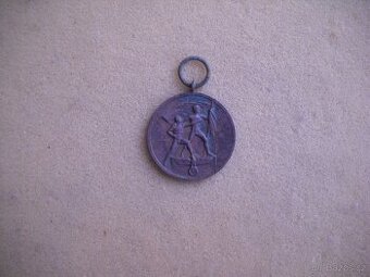 Medaile ,odznaky....