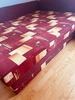 Čalouněná postel s úložným prostorem