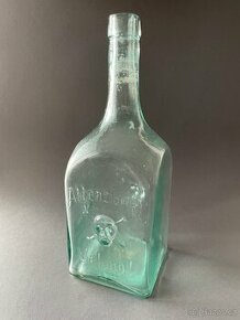 Starožiná skleněná láhev s nápisy Pozor jed a lebkou a hnáty