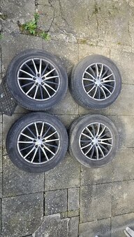 Alu kola R18 5x114,3 z CX7 včetně peu Michelin 235/60 R18