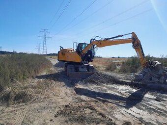 Strojník kolových a pásových rypadla JCB