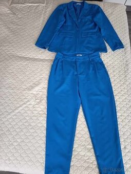 Dámský kalhotový kostým královská modrá barva vel.42