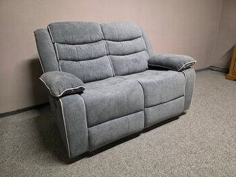 Nový polohovací gauč šedý