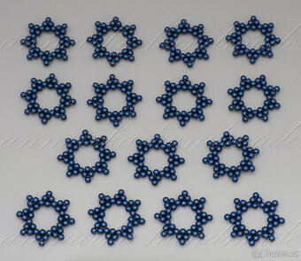 sada patnácti rukodělných vánočních hvězdiček