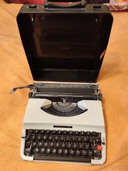 Kufříkový psací stroj Chevron 63