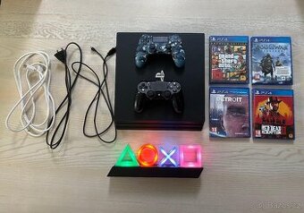 PS4 PRO 1TB+ovladače+hry