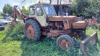 Traktor bagr belarus