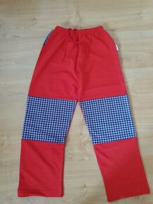Kalhoty červené tepláky v.128 malé děti