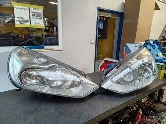 FORD S-MAX -- přední světla "HELLA"
