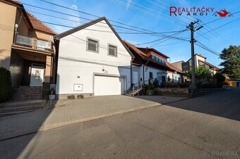 Rodinný dům s prostornou garáží, dílnou, vinným sklepem a vý