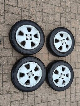 Alu disky+pneu na Opel Astra